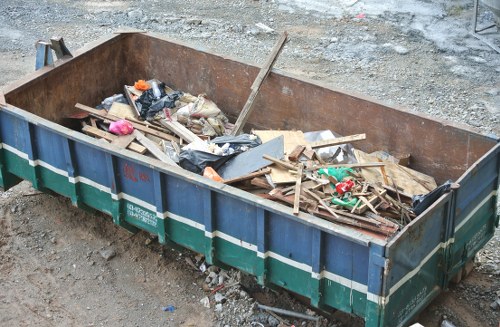 Professional office clearance team organizing workspace in Stoke Newington