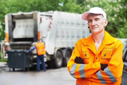 Waste removal vehicles in Stoke Newington showcasing eco-friendly technology